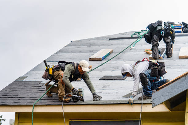 Professional Gutter Installation technician working in White Hall, WV